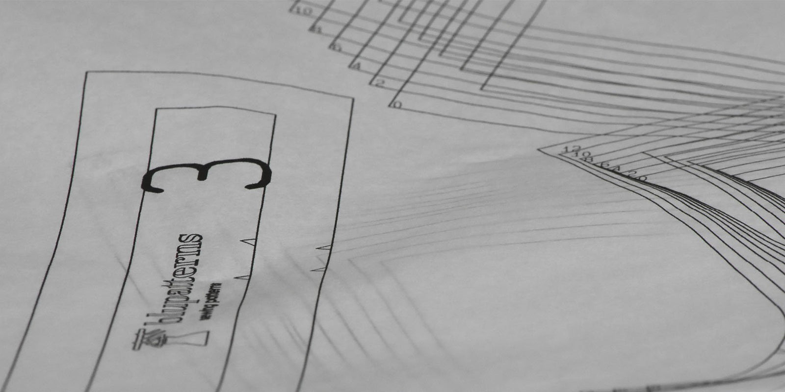 image of tissue paper patterns, for a collection of pant, skirt, and short sewing patterns